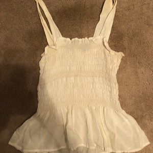 Women’s fitted white tank with thin straps